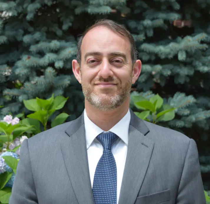 A Headshot of Chief Financial Officer Issa Abbasi.